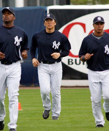 New York Yankees Hideki Matsui (C) jogs with teammates during spring training workouts in Tampa Florida on February 21 2008. (UPI Photo\/Frank Polich)