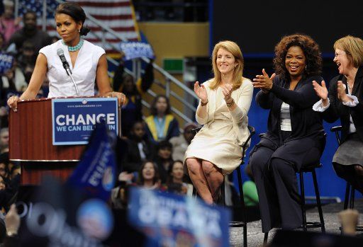 Michelle Obama speaks as Caroline Kennedy Oprah Winfrey and Maria Elena Durazo look on during a rally for Democratic presidential candidate U.S. Senator Barack Obama (D-IL) at UCLA\
