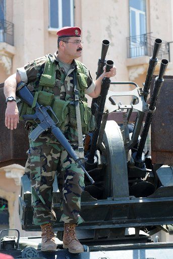 The Lebanese army take over positions in west Beirut that were captured by Hezbollah fighters on May 10 2008. On the fourth day of unrest the capital Beirut is calm but clashes are reported in the Chouf Mountains and in the northern city of Tripoli....
