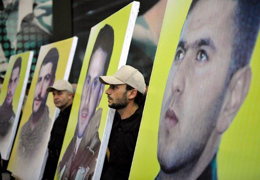 The Lebanese resistance movement Hezbollah holds a funeral for seven of its fighters on July 18 2008. The seven were killed in the 2006 war with Israel and were part of a prisoners swap between the two countries. Israel received the bodies of two ...