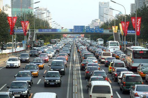 Traffic flows slowly on one of the main arteries just weeks before the start of the 2008 Beijing Olympic Games in Beijing July 23 2008. (UPI Photo\/Stephen Shaver)