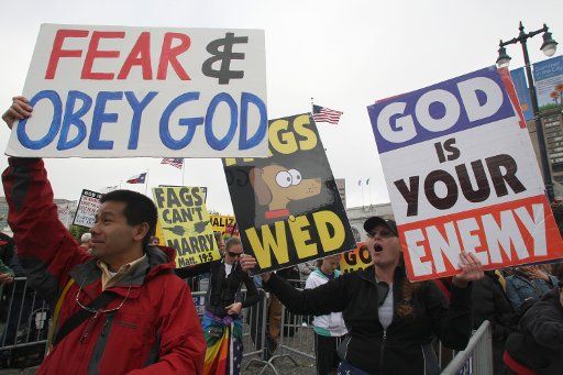 Demonstrators opposed to gay marriage voice their opinions in front of City Hall as gay marriages begin in San Francisco on June 16 2008. (UPI Photo\/Terry Schmitt)
