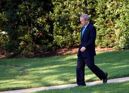 U.S. President George W. Bush walks across the South Lawn of the White House towards Marine One in Washington on August 15 2008. President Bush is traveling to his ranch in Crawford Texas. (UPI Photo\/Patrick D. McDermott)