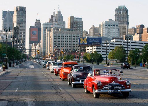 A parade of more than 100 GM classic and iconic vehicles heads up Woodward Avenue in Detroit Michigan during the GM Century Cruise part of the 2008 Woodward Dream Cruise on August 16 2008. The cruise showcases classic GM cars and trucks from its ...