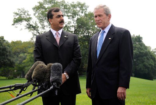 Prime Minister of Pakistan Syed Yousuf Raza Gilani (L) delivers remarks alongside U.S. President George W. Bush following their meeting on the South Lawn of the White House in Washington on July 28 2008. (UPI Photo\/Kevin Dietsch)