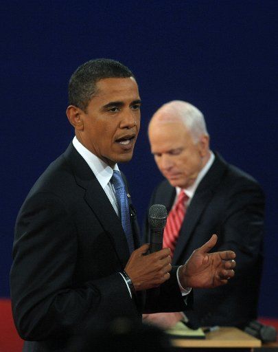 Democratic Presidential Nominee Sen. Barack Obama (IL) and Republican Presidential Nominee Sen. John McCain (AZ) (R) participate in the second presidential debate moderated by journalist Tom Brokaw at Belmont University in Nashville Tennessee on ...