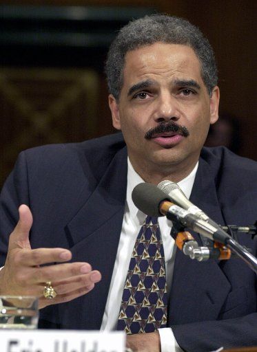 Eric Holder seen in a February 14 2001 file photo in Washington has been picked by President-elect Barack Obama as the next U.S. Attorney General. Holder is currently a senior legal advisor to President-elect Obama and was one of three members of ...
