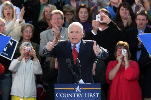 Republican presidential candidate Sen. John McCain (R-AZ) gives a thumbs up following a morning campaign rally in St. Charles Missouri on October 20 2008. (UPI Photo\/Bill Greenblatt)