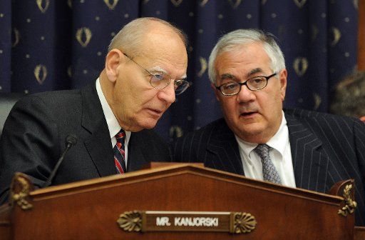 Rep. Paul Kanjorski D-PA (L) speaks with Rep. Barney Frank D-MA as Kanjorski prepares to preside over a House Financial Services Committee hearing examining the Madoff Ponzi-style investor fraud on Capitol Hill in Washington on January 5 2009. ...