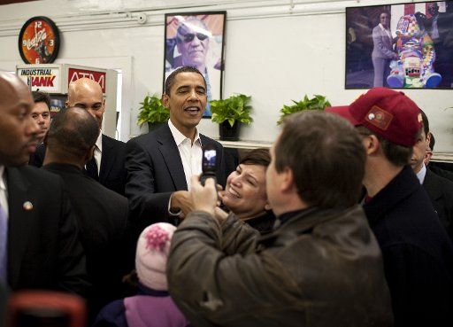 President-elect Barack Obama greets patrons at Ben\