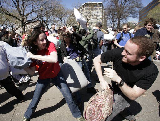 People take part in massive pillow fight on Dupont Circle in Washington on April 4 2009. (UPI Photo\/Yuri Gripas)
