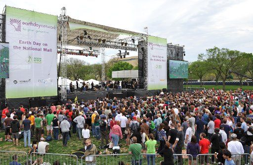 People gather to see Los Lobos perform during the Earth Day on the Mall concert on the National Mall in Washington on April 19 2009. (UPI Photo\/Kevin Dietsch)