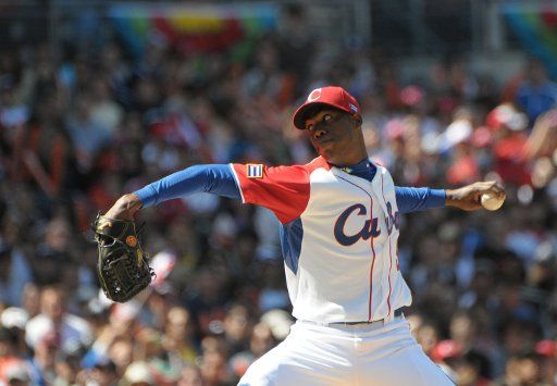 Pitcher Alberto Chapman De La Cruz of the Cuban baseball team throws the ball as Cuba plays Japan at Petco Park during the World Baseball Classic in San Diego March 15 2009. ( UPI Photo\/Earl S. Cryer)