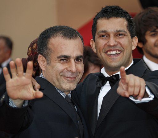 Director Bahman Ghobadi (L) and actor Hamed Behdad arrive on the red carpet before a screening of the Chinese film "Spring Fever" at the 62nd annual Cannes Film Festival in Cannes France on May 14 2009. (UPI Photo\/David Silpa)