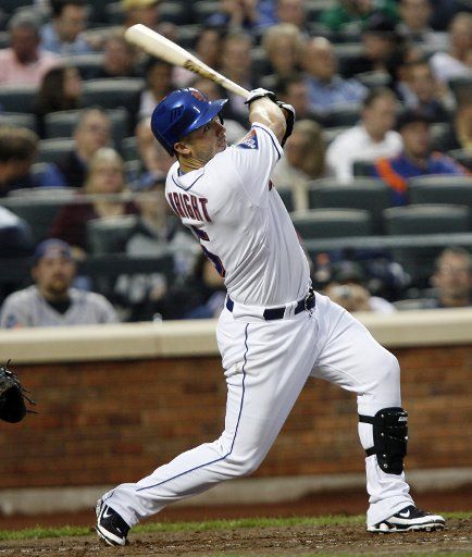 New York Mets David Wright hits a single in the second inning against the Philadelphia Phillies at Citi Field in New York City on June 10 2009. (UPI Photo\/John Angelillo)