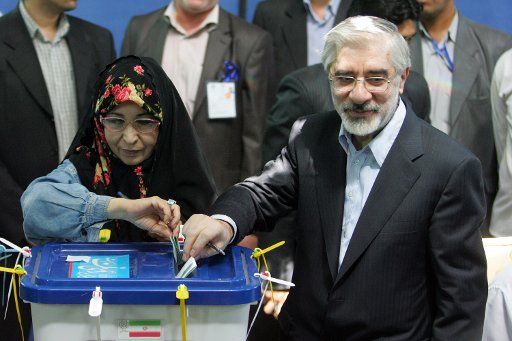 Iranian former prime minister and leading reformist candidate in the upcoming presidential election Mir-Hossein Mousavi (R) and his wife Zahra Rahnavard cast their votes for presidential election in Tehran Iran on June 12 2009. (UPI Photo\/Mohammad ...