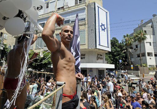 An Israeli gay man dances in the Gay Pride Parade in Tel Aviv Israel June 12 2009. (UPI Photo\/Debbie Hill)