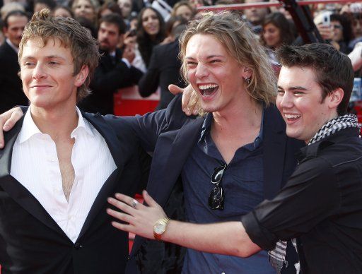 Charlie Bewley (L) Jamie Campbell Bower (C) and Cameron Bright arrive on the red carpet before a screening of a few scenes from the upcoming film "The Twilight Saga: New Moon" during the 4th Rome International Film Festival in Rome on October 22 ...
