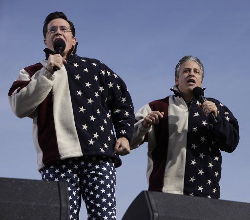Comedy Central comedians Jon Stewart (R) and Stephen Colbert (L) perform during the "Rally to Restore Sanity And\/Or Fear" on the National Mall in Washington on October 30 2010. UPI Photo\/Yuri Gripas..