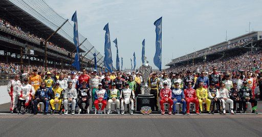 Drives pose for a group photo before the 95th running of the Indianapolis 500 at Indianapolis Motor Speedway in Indianapolis on May 29 2011. UPI \/Mark