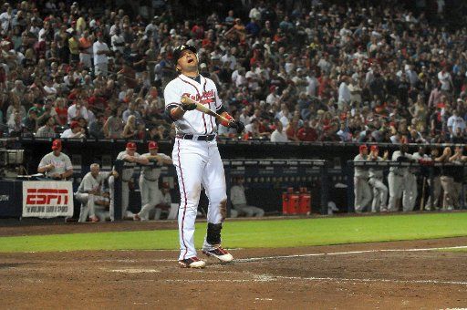Atlanta Braves third baseman Martin Prado reacts after striking out to the Philadelphia Phillies in the 10th inning of a MLB baseball game at Turner Field in Atlanta Georgia on September 28 2011. The Phillies defeated the Braves 4-3 eliminating ...