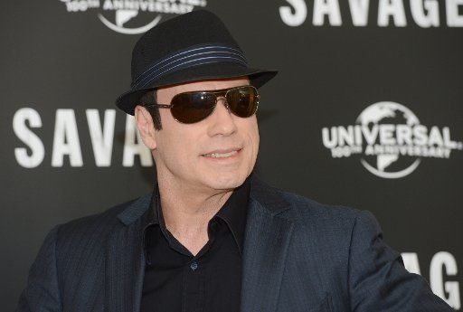 American actor John Travolta attends a photo call for "Savages" at Mandarin Oriental Hotel in London on September 19, 2012. UPI\/Rune