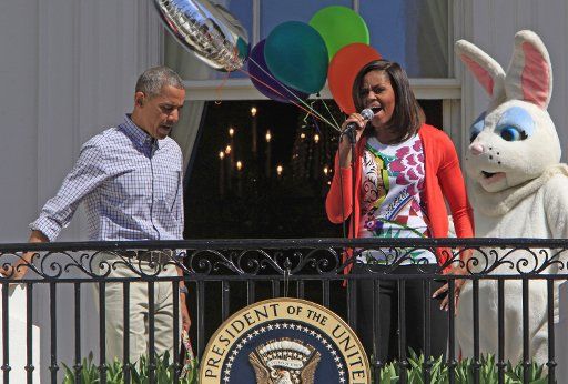 President Barack Obama and First Lady Michelle Obama participate in the White House Easter Egg Roll on the South Lawn on April 6,2015. Pool photo by Dennis Brack\/
