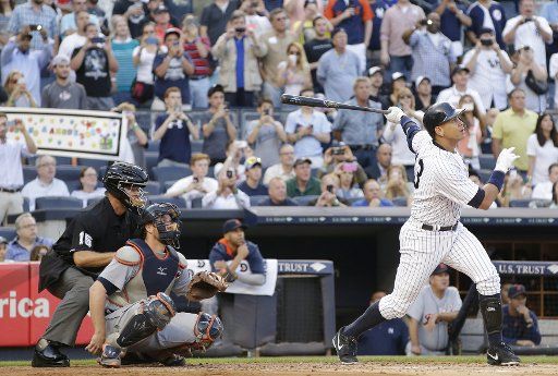 New York Yankees Alex Rodriguez hits career MLB hit number 3000 with a solo home run in the first inning against the Detroit Tigers at Yankee Stadium in New York City on June 19, 2015. Photo by John Angelillo\/