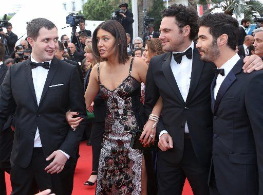 (From L to R) Guillaume Gouix, Adele Exarchopoulos, Elie Wajeman, and Tahar Rahim arrive on the red carpet before the screening of the film "Irrational Man" during the 68th annual Cannes International Film Festival in Cannes, France on May 15, 2015. ...