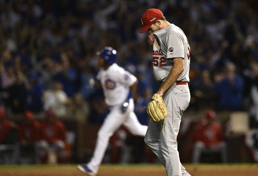 St. Louis Cardinals starting pitcher Michael Wacha reacts after Chicago Cubs\
