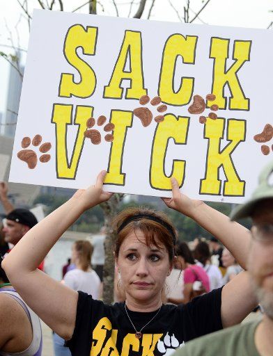 Demonstrators protest the Pittsburgh Steelers signing of Mike Vick before the start of the Steelers preseason game against the Carolina Panthers outside of Heinz Field in Pittsburgh on September 3, 2015. Photo by Archie Carpenter\/
