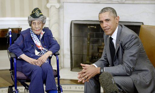 President Barack Obama meets with 110-year-old Emma Didlake, who is believe to be the oldest living U.S. veteran, in the Oval Office of the White House July 17, 2015 in Washington, DC. A resident of Detroit, Michigan, Didlake was a private in the ...