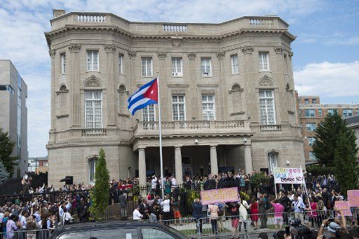 A Cuban flag is raised over during a ceremony to reopen the Cuban embassy to the United States, in Washington, D.C. on July 20, 2015. After 54 years Cuba\