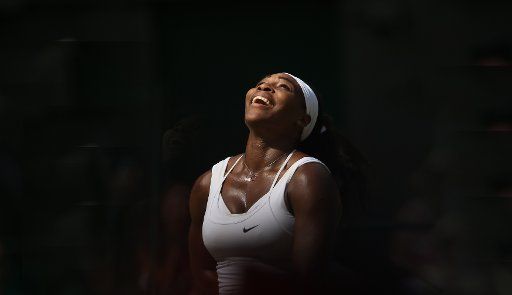 American Serena Williams smiles after winning the Women\