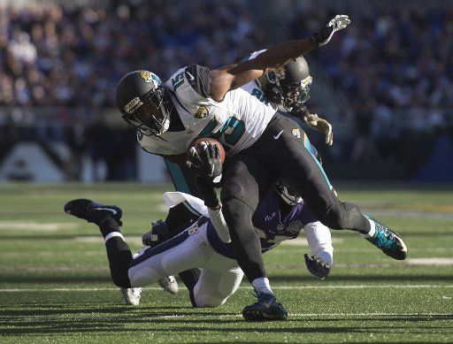 Jacksonville Jaguars wide receiver Allen Robinson (15) runs against the Baltimore Ravens defense in the second quarter at M&T Bank Stadium in Baltimore, Maryland on November 15, 2015. Photo by Kevin Dietsch\/