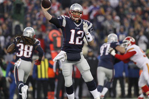 New England Patriots quarterback Tom Brady (12) throws a pass in the first quarter of the AFC Divisional Playoff game against the Kansas City Chiefs in Foxborough, Massachusetts on January 16, 2016. Photo by Matthew Healey\/