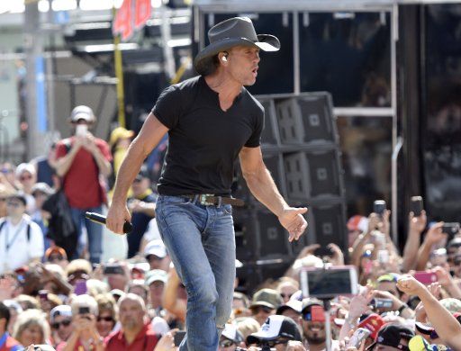 Country music singer Tim McGraw performs at the NASCAR Nationwide Series Championship in Homestead, Florida on November 22, 2015. Photo By Gary I Rothstein\/
