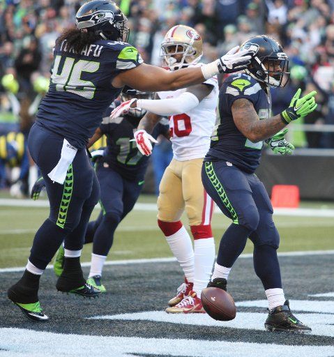 Seattle Seahawks running back Thomas Rawls (34) celebrates his 2-yard touchdown run against the San Francisco 49ers at CenturyLink Field in Seattle, Washington on November 22, 2015. The Seahawks beat the 49ers 29-13. Photo by Jim Bryant\/