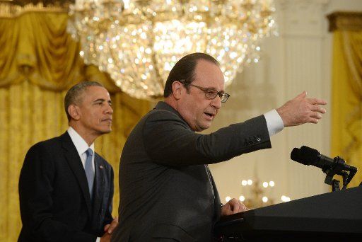 French President Francois Hollande makes a point during joint press conference with U.S. President Barack Obama in the East Room of the White House in Washington, D.C. on November 24, 2015. The two discussed various world issues including the ...