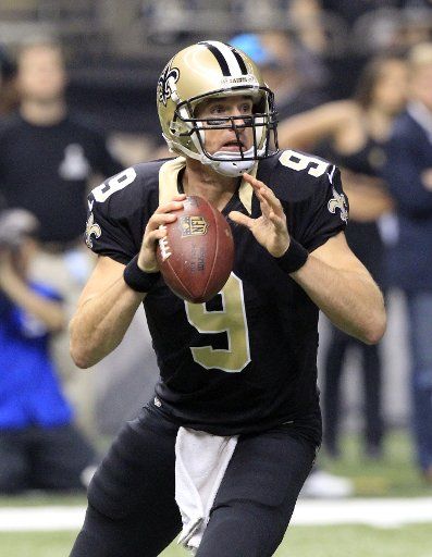 New Orleans Saints quarterback Drew Brees (9) looks to throw the ball down field during the first quarter against the Carolina Panthers at the Mercedes-Benz Superdome in New Orleans December 6, 2015. Photo by AJ Sisco\/