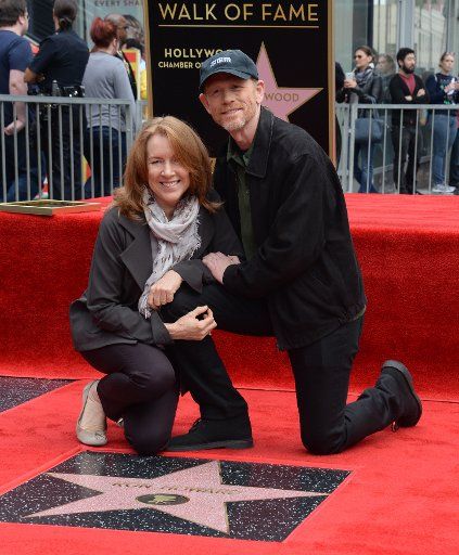 Director and actor Ron Howard is joined by his wife Cheryl Howard during an unveiling ceremony honoring him with the 2,568th star on the Hollywood Walk of Fame in Los Angeles on December 10, 2015. Photo by Jim Ruymen\/