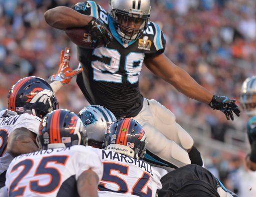 Carolina Panthers running back Jonathan Stewart (28) scores on a 1-yard run against the Denver Broncos during the second quarter Super Bowl 50 in Santa Clara, California on February 7, 2016. Photo by Kevin Dietsch\/