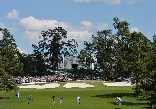 Jordan Spieth hits his approach shot to the 7th hole in the second round of the 2016 Masters Tournament at Augusta National in Augusta, Georgia on April 8, 2016. Tom Watson announced that this 2016 Masters will be his last. Photo by Kevin ...