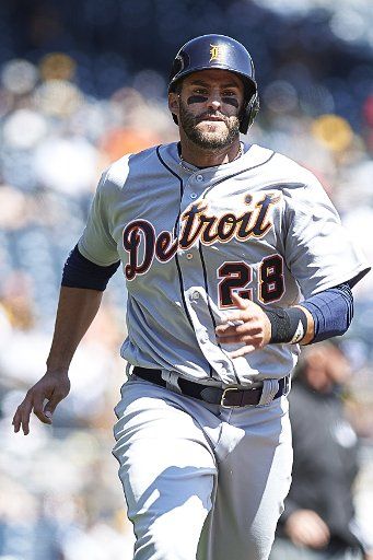 Detroit Tigers right fielder J.D. Martinez (28) eyes home plate as he scores on a Nick Castellanos double at PNC Park in Pittsburgh on April 14, 2016. Photo by Shelley Lipton\/