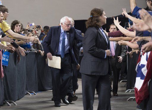Democratic presidential candidate Bernie Sanders greets supporters as he arrives for a rally in Baltimore, Maryland, April 23, 2016. Photo by Molly Riley\/