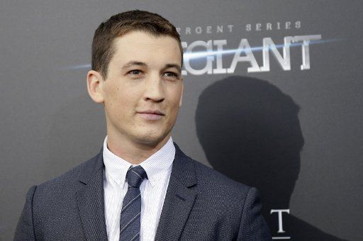 Miles Teller arrives on the red carpet at the New York premiere of Allegiant at the AMC Lincoln Square Theater on March 14, 2016 in New York City. Photo by John Angelillo\/