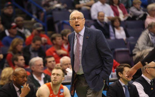 Syracuse head coach Jim Boeheim watches his team take on Dayton in the first half of the NCAA Division 1 Men\