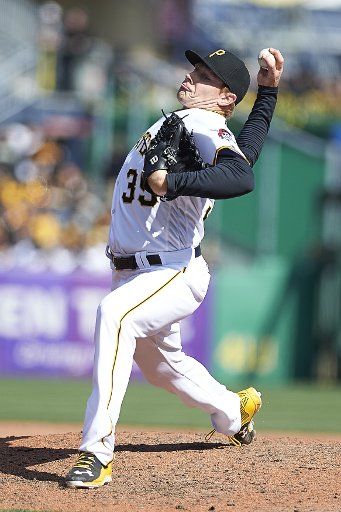 Pittsburgh Pirates relief pitcher Mark Melancon (35) throws a pitch in the ninth inning against the St. Louis Cardinals on Opening Day at PNC Park in Pittsburgh, on April 3, 2016. Photo by Shelley Lipton\/