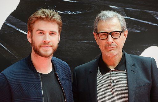 American actor Jeff Goldblum and Australian actor Liam Hemsworth attend a photo call for Independence Day: Resurgence at Euston Station in London on June 6, 2016. Photo by Rune Hellestad\/