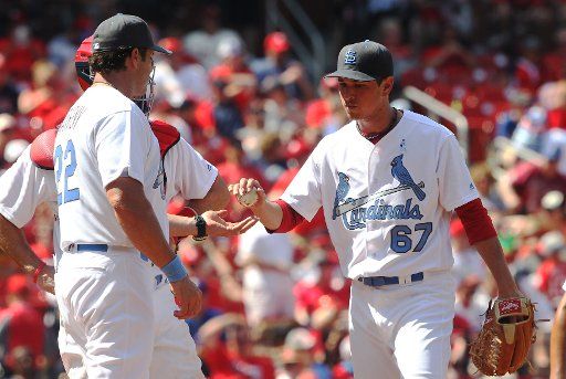St. Louis Cardinals Matt Bowman is removed from the game by manager Mike Matheny after giving up the go ahead run to the Texas Rangers in the eighth inning at Busch Stadium in St. Louis on June 19, 2016. Texas won the game 5-4. Photo by Bill ...